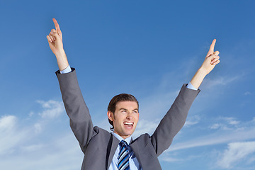 Image showing Celebrate, happy business man and blue sky with happiness and success feeling excited from promotion. Outdoor, businessman and worker with smile from target achievement and goals with celebration