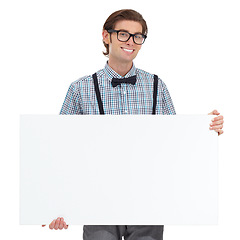 Image showing Portrait, smile and man with board for mockup in studio isolated on a white background. Poster, glasses and happy, funny person or nerd with copy space for advertising, marketing or promotion banner.