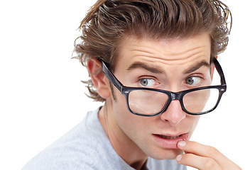 Image showing Surprised, glasses and man in shock or anxiety, worried face and isolated closeup on white studio background. Omg, wow or wtf and nerd looking confused with doubt, fear or worry, stress or shock