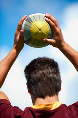 Image showing Sports, rugby and man with a ball in hands while thinking or planning strategy. Headshot of male athlete person playing outdoor in sport competition, game or training for fitness, workout or exercise