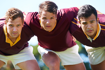 Image showing Rugby, sports and men for team portrait outdoor on pitch for scrum, hug or teamwork. Male athlete group playing together in sport competition, game or training match for fitness, workout or exercise