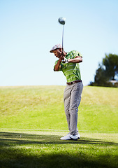 Image showing Sports, golf swing and black man with stroke in game, match and competition on golfing course. Recreation, hobby and male athlete with club driver on grass for training, fitness and golfer practice