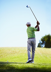 Image showing Sports, golf and black man ready for stroke in game, match and competition on golfing course. Recreation, hobby and male athlete in action with club driver on grass for training, fitness and practice