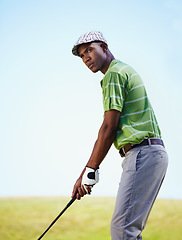 Image showing Sports, golf and black man focus for stroke in game, match and competition on golfing course. Recreation, hobby and male athlete ready with club driver on grass for training, fitness and practice