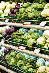 Image showing Food, grocery and health with fresh produce in supermarket for sale, nutrition and retail. Shopping, natural and offer with organic vegetables on shelf of store for diet, purchase and salad products