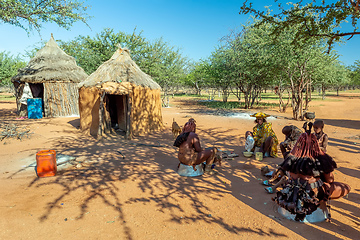 Image showing Himba woman with child in the village