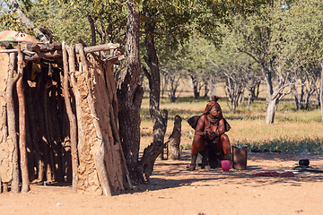 Image showing Himba woman with in the village, namibia Africa