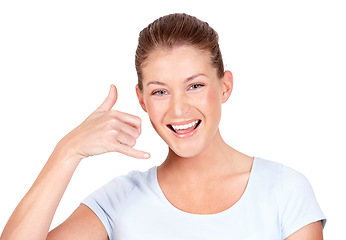 Image showing Portrait, woman and call me with smile, white background and hands for communication in isolated studio. Happy face, female model and telephone sign for talking, contact or connection of conversation