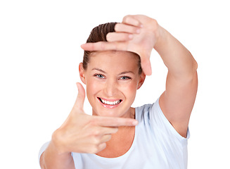 Image showing Portrait, finger frame and happy woman in white background, isolated studio and review profile picture. Face, female model and hands for perspective, selfie and inspiration for creative photography