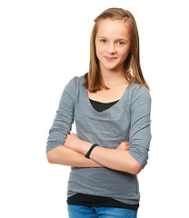 Image showing Teenager, girl and portrait smile with arms crossed standing isolated against a white studio background. Young female teen person or model smiling and posing in confidence with casual clothing