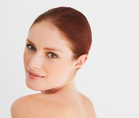 Image showing Skincare, red hair and portrait of woman in studio for cosmetics, wellness and facial on white background. Dermatology, spa and face of female person with natural makeup, beauty and healthy skin