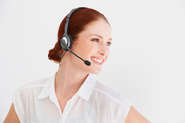 Image showing Call center, smile and consulting with woman in studio for telemarketing, customer service and help desk. Happy, communication and contact us with consultant isolated on white background for mockup