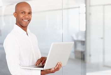 Image showing Portrait, business and black man with laptop in office to work on career or job with pride. Computer, male entrepreneur and African person from Nigeria in professional workplace with smile on mockup