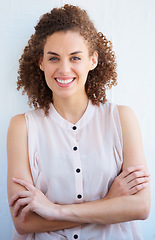 Image showing Portrait, business woman and arms crossed in office with pride for career, job or occupation. Professional, entrepreneur and female designer or person from Australia with confidence and happiness.
