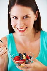 Image showing Woman, portrait and eating a healthy fruit salad with berries, nutrition and health benefits. Face of a happy female person on nutritionist diet with vegan food for weight loss, wellness or detox