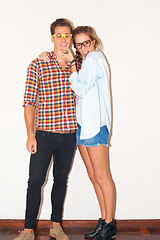 Image showing Goofy portrait of hipster couple, funny face with glasses and gen z fashion with university youth culture. Happiness, woman and man in crazy picture on fun college date with white wall background.