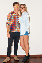 Image showing Crazy portrait of hipster couple with glasses, funny face and gen z fashion with university youth culture. Happiness, goofy woman and man in at fun college, students on white wall background.