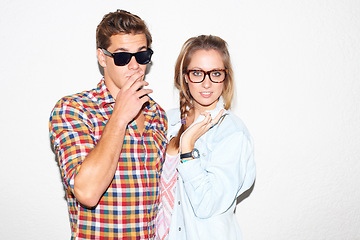 Image showing Portrait of cool couple at party, sunglasses on face and gen z fashion with university culture in youth. Nerd students, woman and man in crazy picture at college, hipster people on wall background.