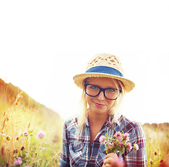 Image showing Portrait, countryside and woman with flowers in field for freedom, wellness and fresh air outdoors. Nature, summer and hipster female person in natural meadow for relaxing, calm and peace in morning