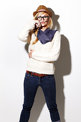 Image showing Portrait, hipster and isolated girl with moustache on index finger, nerd glasses and fun pose on studio white background. Young woman, modern fashion and mustache joke or goofy, weird and photobooth