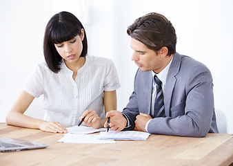 Image showing Business people with documents in meeting, team and analysis in office conference room with collaboration. Data analyst employees working together, man and woman with teamwork and corporate paperwork