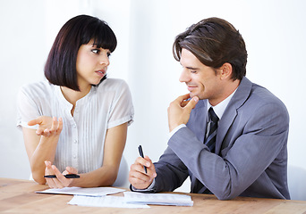 Image showing Business people in discussion about paperwork in meeting, team in conference room and collaboration. Data analysis, employees coworking with man and woman in office, teamwork and review documents