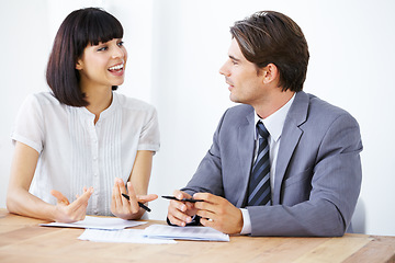 Image showing Business people are talking about paperwork in meeting, team in conference room and collaboration. Data analysis, employees coworking with man and woman in office, teamwork and plan with documents