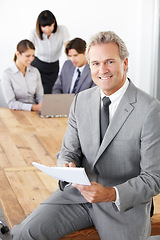 Image showing Business man in portrait, leadership in meeting with paperwork and corporate CEO in conference room. Senior executive male smile, presentation and professional businessman in workplace with pride