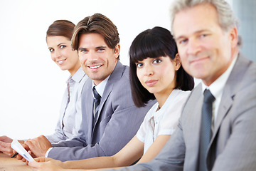 Image showing Portrait, collaboration and a team of business colleagues sitting in the boardroom for a strategy meeting. Teamwork, planning or training with corporate men and women working together in the office