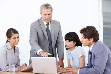 Image showing Planning, coaching and laptop with business people in meeting for teamwork, idea and project management. Training, consulting and technology with ceo and employees for mentor, leadership and review