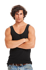 Image showing Crossed arms, fashion and portrait of man on a white background with confidence, pride and trendy style. Attitude, clothing mockup and isolated handsome, serious and young male person in studio