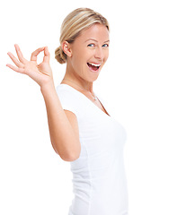 Image showing Excited woman, hand sign and ok portrait in studio for happiness, agreement and support. Face of a happy female model isolated on a white background to show hands, icon or emoji for review or opinion