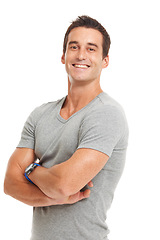 Image showing Man, portrait and arms crossed in studio with pride and casual fashion with a smile. White background, male person and model confidence with strong, style and tshirt with happiness and smiling