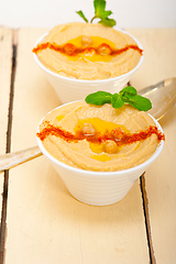 Image showing Hummus with mint on top