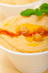 Image showing Hummus with mint on top