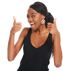 Image showing Happy, thumbs up and wink with portrait of black woman. for approval, emoji and welcome. Hand, smile and confident with face of girl isolated on white background studio for yes, agreement and ok sign