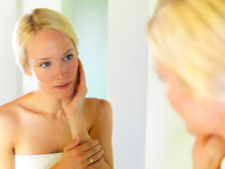 Image showing Skincare, beauty and mirror with woman in bathroom for spa, facial and anti aging product. Wellness, luxury and shower with face of girl in reflection at home for cosmetics, cleaning and self care