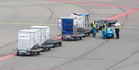 Image showing AMSTERDAM - JUNE 29, 2017: Planes are being loaded at Schiphol A