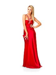 Image showing Fashion, beauty and elegant woman in red dress or evening gown for prom, bridesmaid or formal event against white studio background. Beautiful lady feeling confident in designer wear and accessories