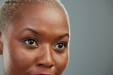 Image showing African woman, closeup headshot and thinking in studio for vision, strategy or ideas by background. Girl, mindset and looking to future, life or career with eyes, focus and solution by grey backdrop
