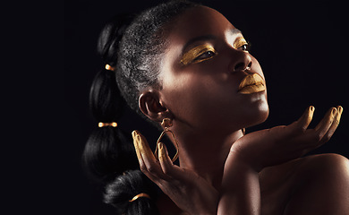 Image showing Makeup, glitter and black woman in studio for beauty, luxury and body care on black background, Gold, art and African female model with wealth, glow and jewellery, elegance and posing royal aesthetic