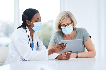 Image showing Doctor, woman and tablet for consulting with mask, talking and advice for healthcare, wellness and support. Medic, patient and hospital for covid with mobile touchscreen app, results and feedback