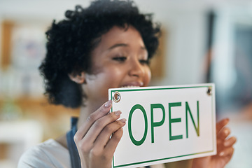 Image showing Happy woman, open sign and window at cafe in small business of waitress for morning or ready to serve. Female person or restaurant server holding board for coffee shop, store or cafeteria opening