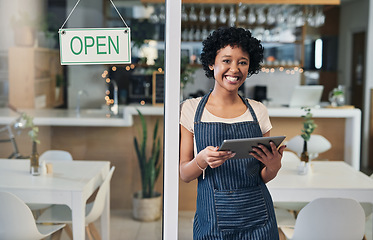 Image showing Happy woman, tablet and portrait of waitress with open sign for communication, social media or online order at cafe. Female person or barista in small business with smile on technology at coffee shop