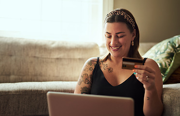 Image showing Credit card, laptop and woman for home online payment, website shopping or ecommerce with fintech application on floor. Happy person on computer for internet banking, sale or discount on subscription