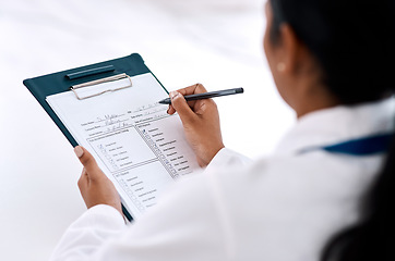 Image showing Checklist, woman doctor with clipboard and pen at the hospital. Check mark or tick for correct, document or scan results of person and medical female writing notes or prescription on page or sheet