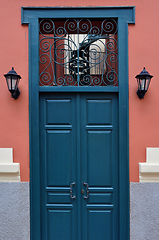 Image showing blue door with antique iron pattern