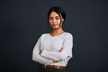 Image showing Serious, mockup and portrait of a black woman arms crossed isolated in a gray background studio ready for work. Proud, dark and African female person or professional confident and focus on job