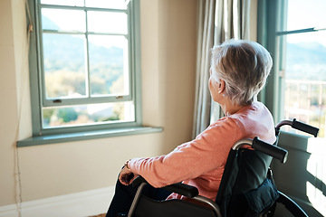 Image showing Woman, nursing home and wheelchair by window for thinking, vision or person with disability, rehabilitation or relax. Elderly lady, remember or looking ahead in retirement, house or memory in morning