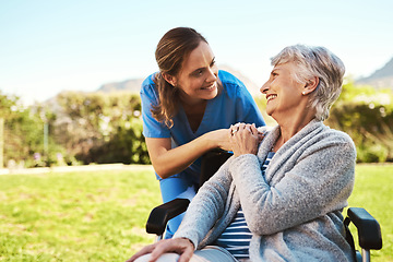 Image showing Senior woman, nurse and wheelchair in life insurance, healthcare support or garden at nursing home. Happy elderly female and caregiver for person with a disability, health or retirement in nature
